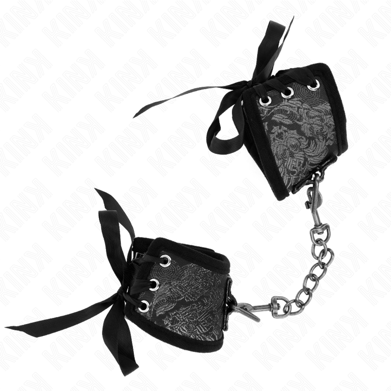 KINK - SCANDAL HANDGELENKSFESSELN SCHWARZE SPITZENDETAILS 24,5 CM X 6,5 CM